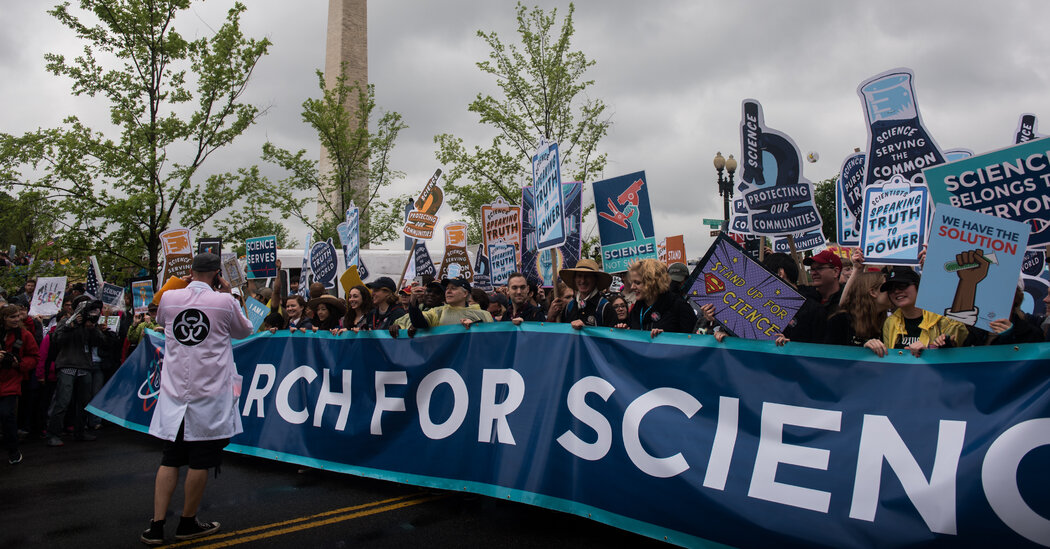 Hit by 'Gut Punches', scientists put together to protest against Trump